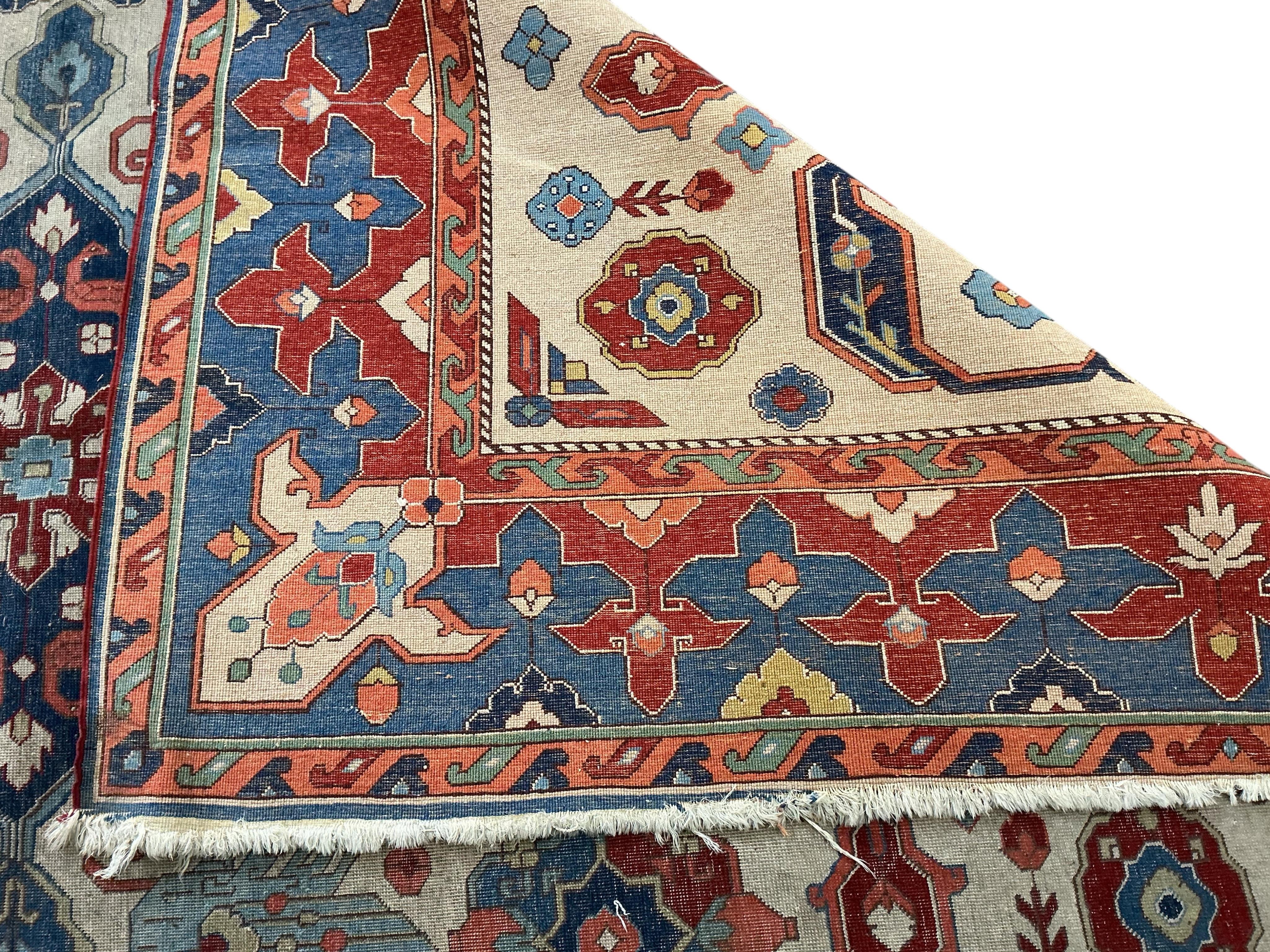 A Persian ivory ground Shirvan style carpet, approximately 300 x 198cm